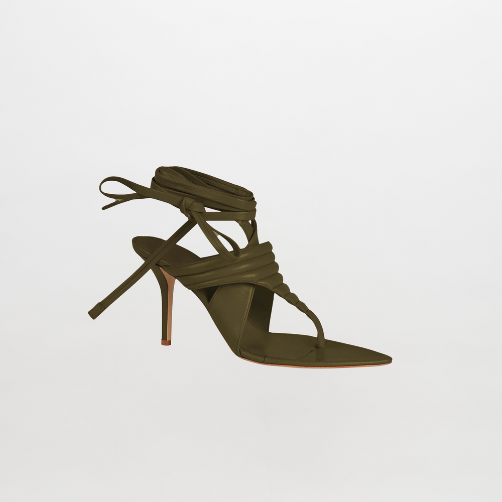 Dalila Heels Olive in Italian calf leather feature a pointed toe, slender high heel, and wrap-around ankle straps, shown against a plain white background.