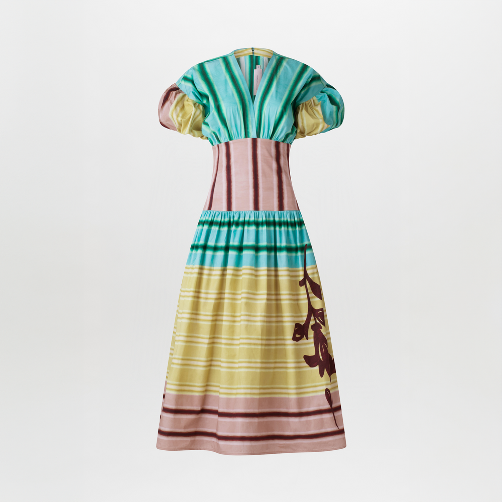 A Darice Dress Meadow View with puffed sleeves and a multicolor stripe pattern in shades of green, pink, and beige, featuring a floral design on the lower part, isolated on a white background.