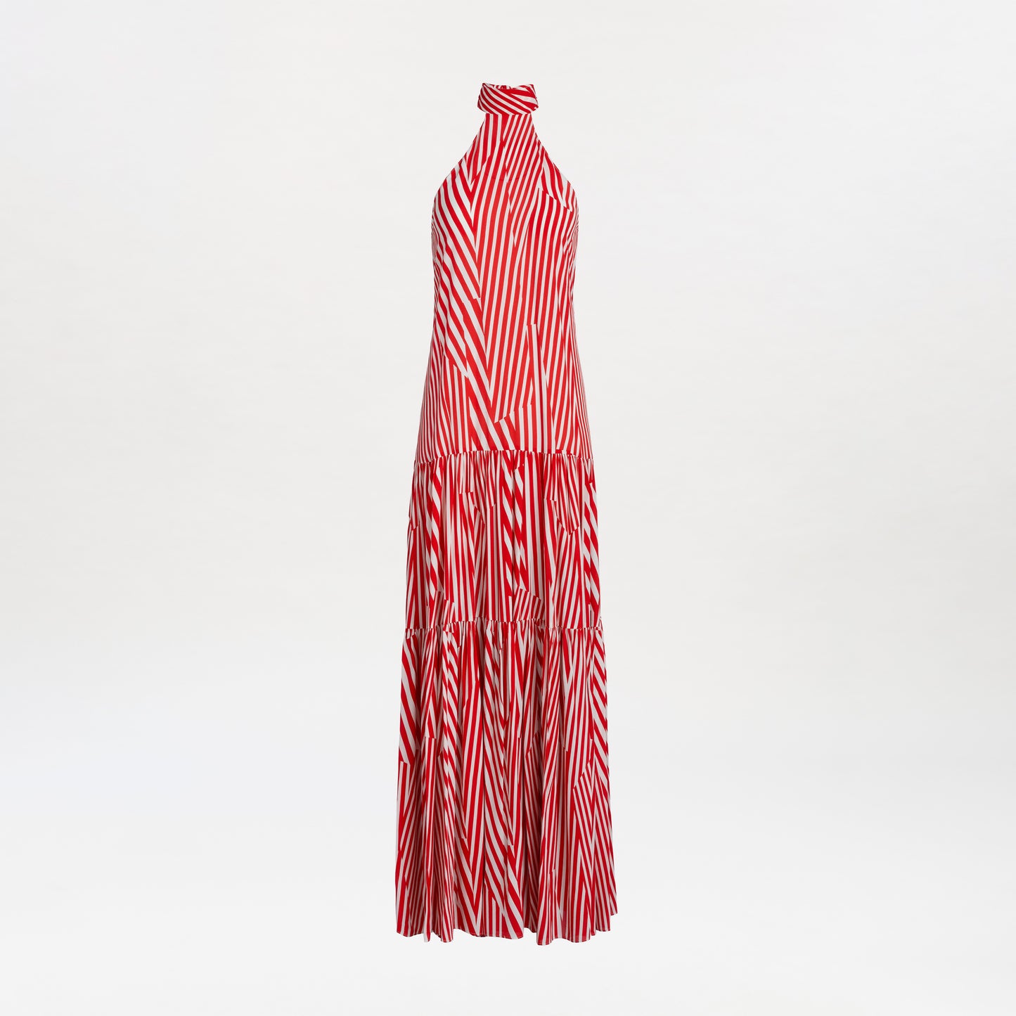 Dorelia Dress—a red and white striped halter-neck maxi dress featuring a tiered skirt, shown against a plain white background.