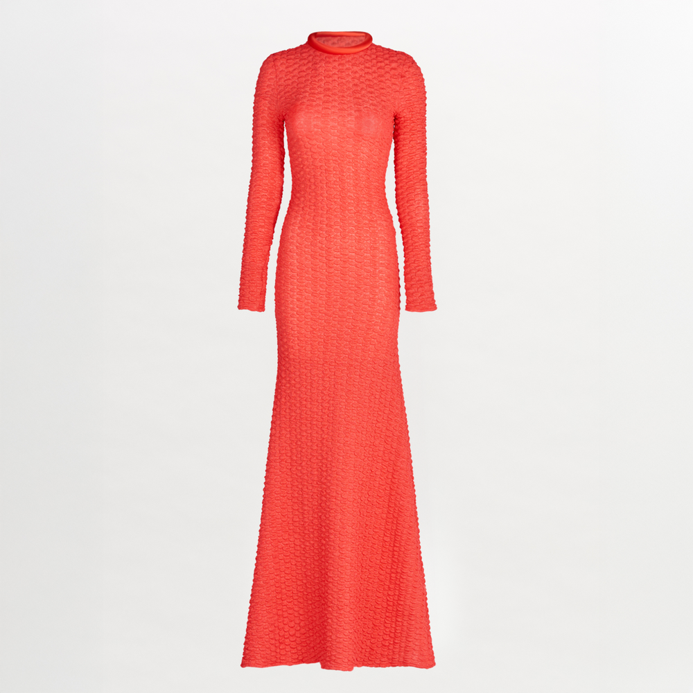 The Gabbice Dress Rouge in coral fabric is long-sleeved.