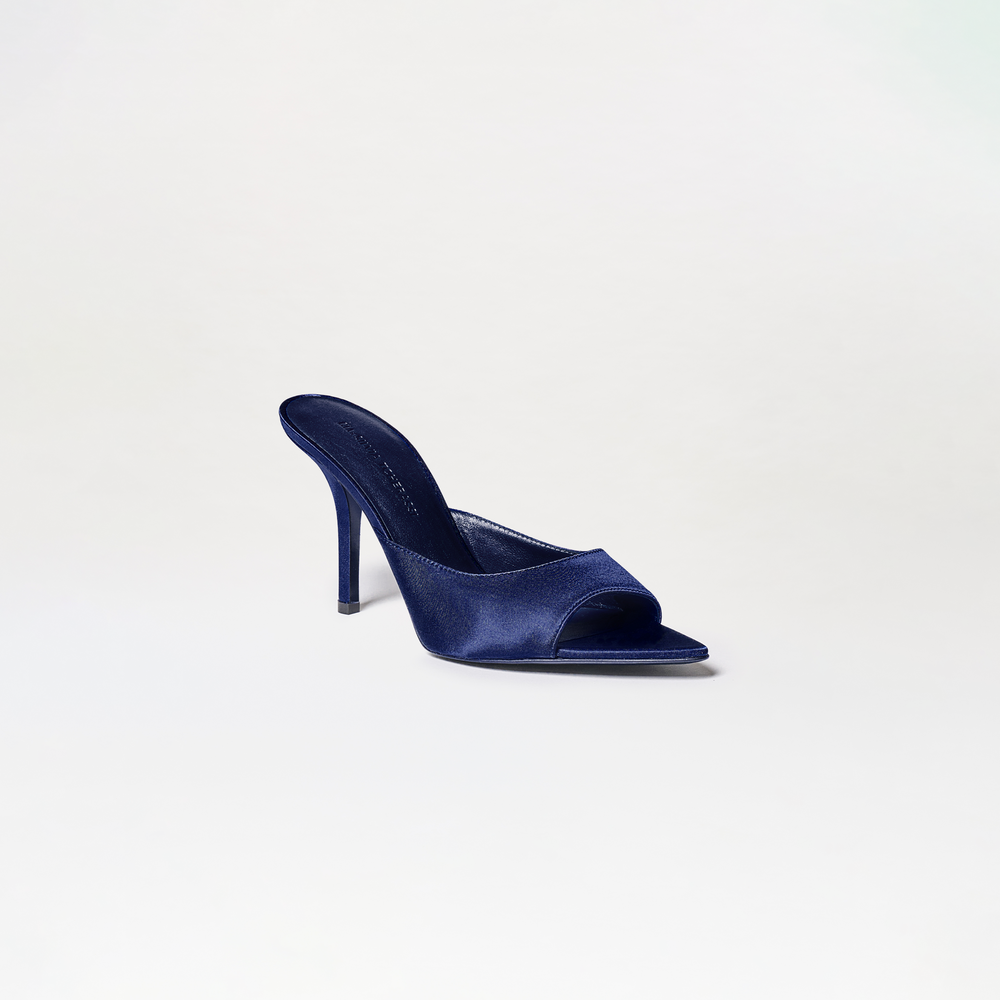 The Perni Heels: a single navy blue, open-toe mule with high heels, showcased against a plain light background.
