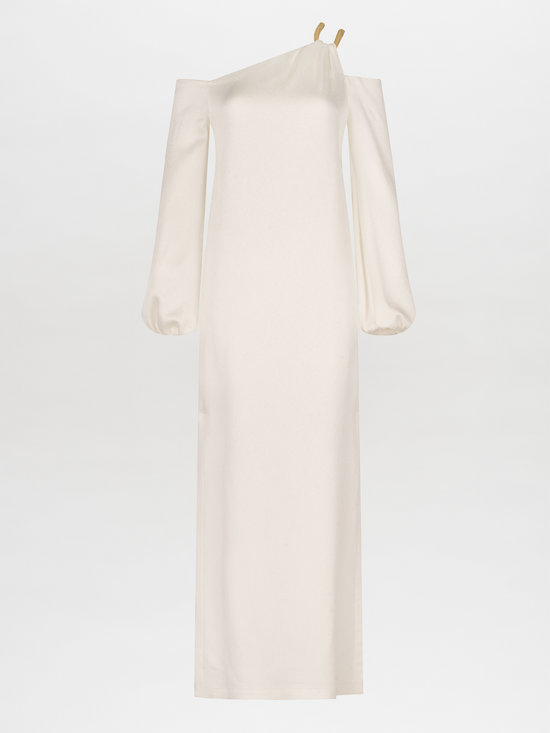 A Ada Dress White with a metallic gold shoulder detail.