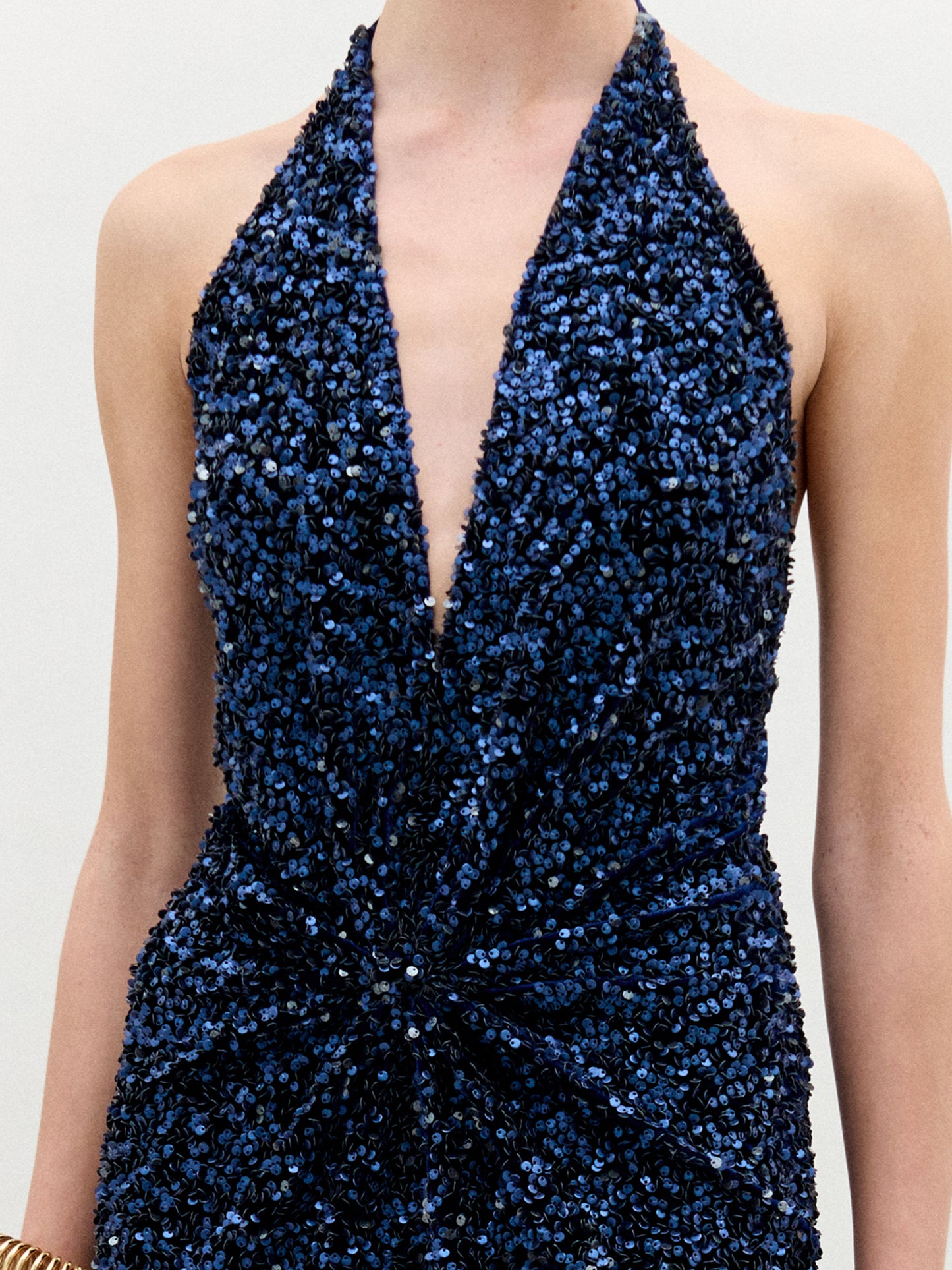 A woman wearing the Aiko Dress in color Navy on a white background.