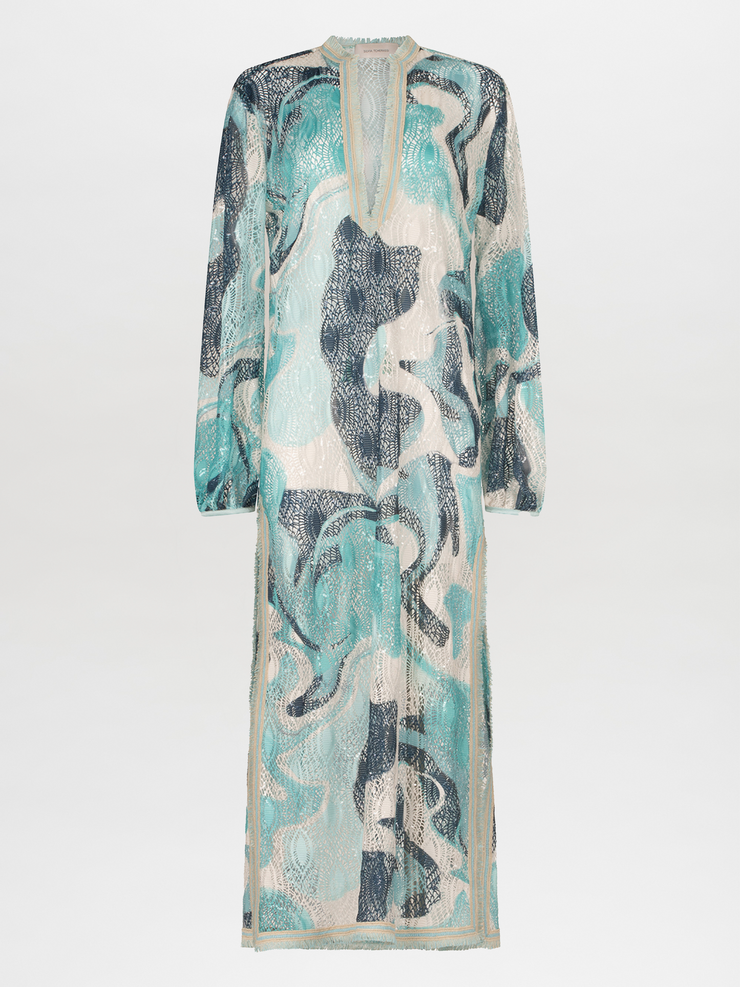 A long Akira Tunic Turquoise Marble with a multicolor abstract print.