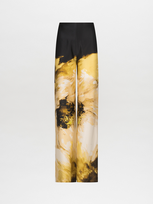 Andie Pant Golden Peony with a floral pattern.