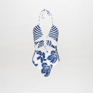 The Arai One Piece Azure Floral Stripes is a stylish swimsuit with a halter neck, chic cutouts, a blue and white striped top, and a floral striped print bottom on a crisp white background.