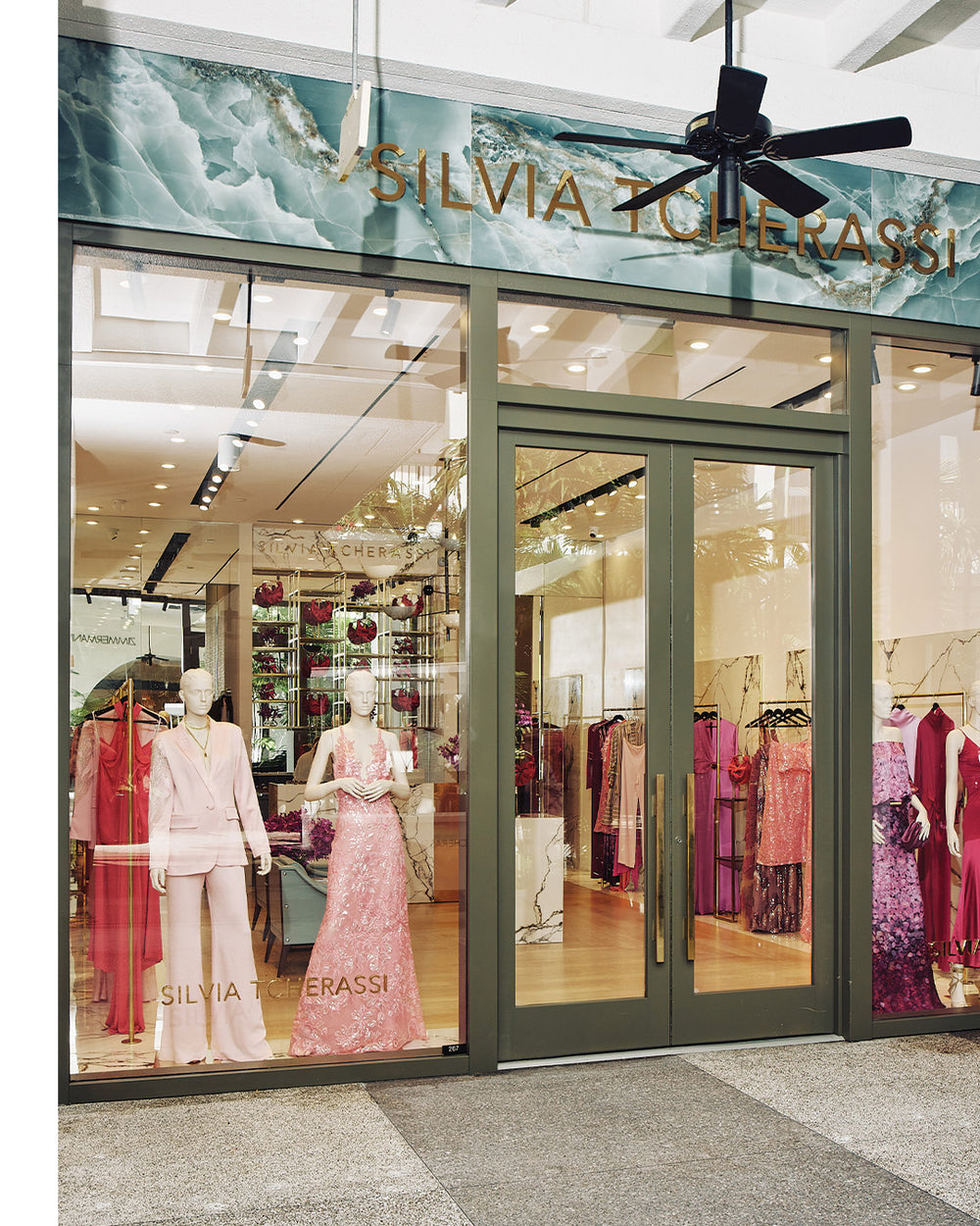 Silvia Tcherassi store front with mannequins wearing pink outfits