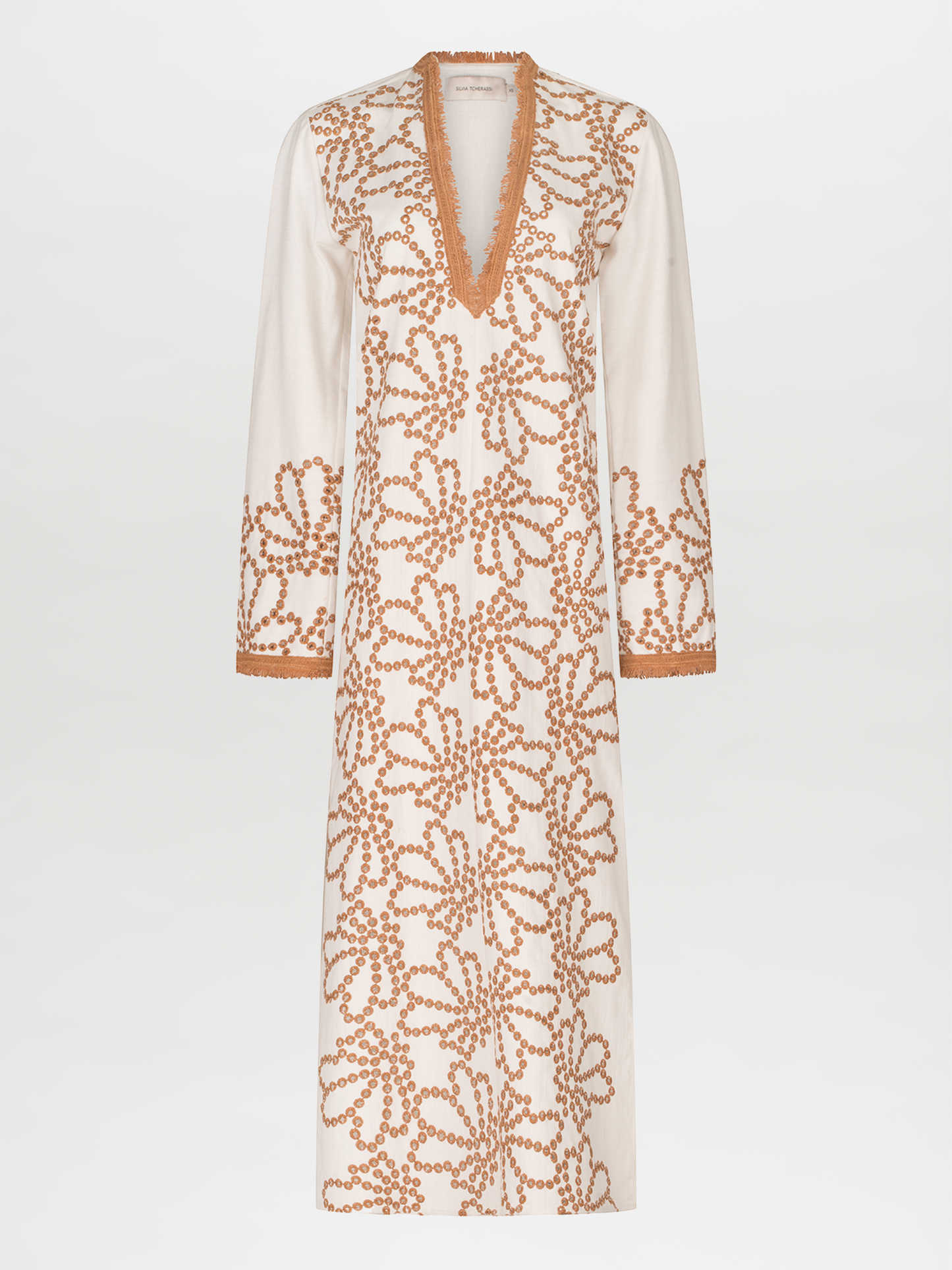 A Bernice Tunic White Cacao Eyelet dress with floral embroidery and embroidered eyelet contrast.