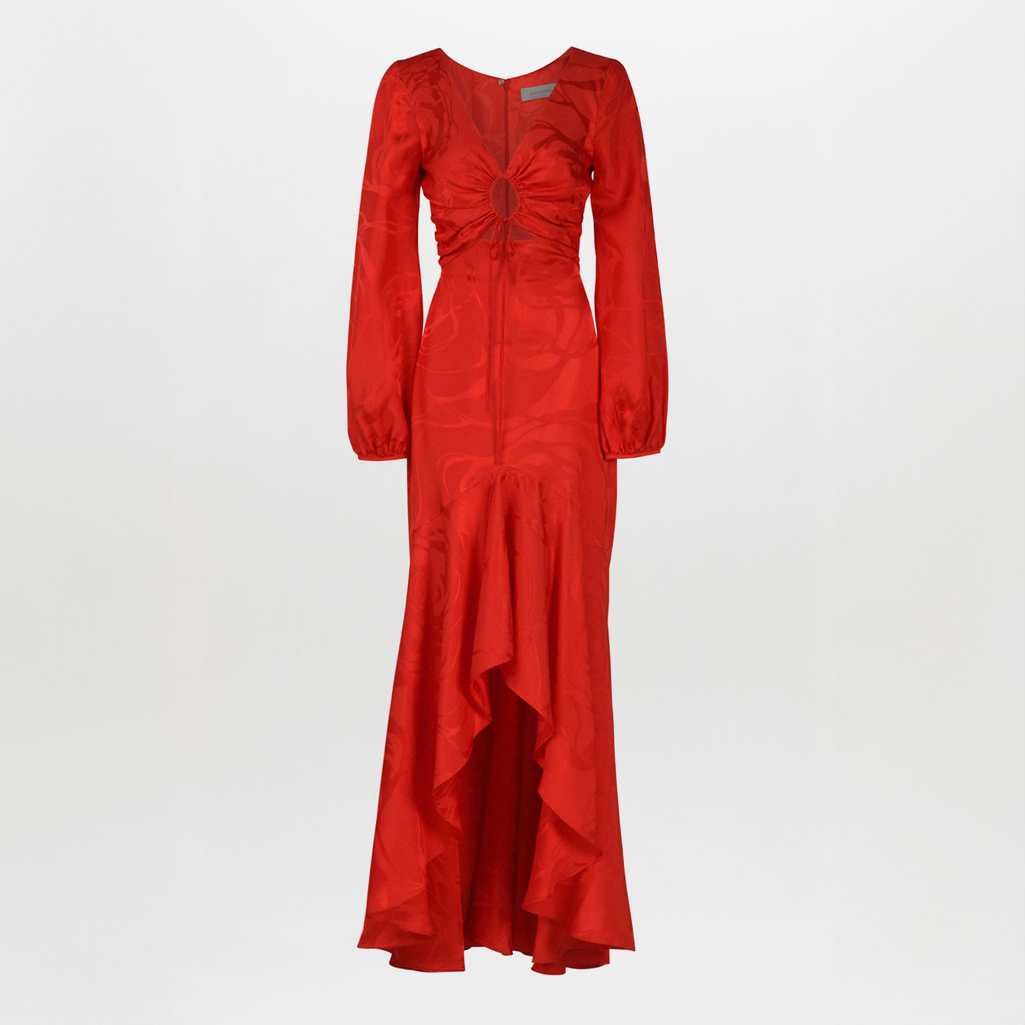 The Charlize Dress Crimson Jacquard features long sleeves, a V-neckline, gathered front with a small keyhole cutout, and a high-low ruffled hem, shown against a plain white background.