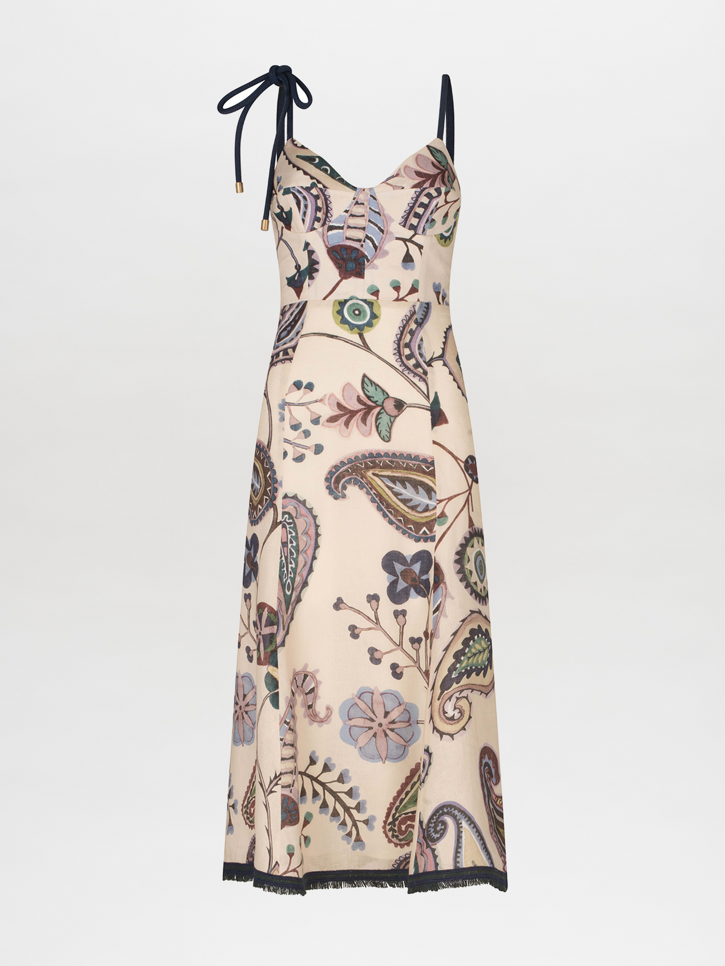 Introducing the Dalil Dress Blue Green Paisley: a sleeveless beige midi dress adorned with a vibrant floral and leaf pattern. It features a unique black tie strap on one shoulder and delicate fringe lace detailing, adding an elegant touch.