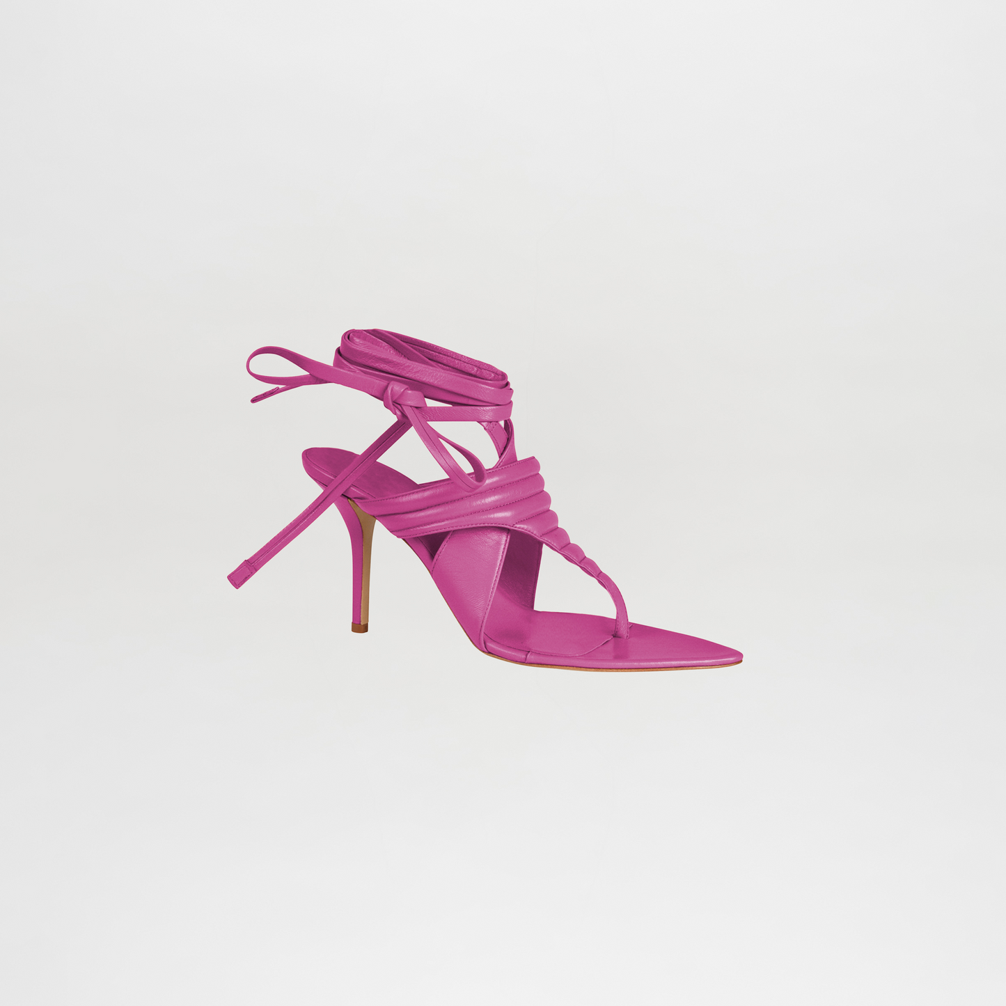Pink strappy high-heeled sandal on a light gray background