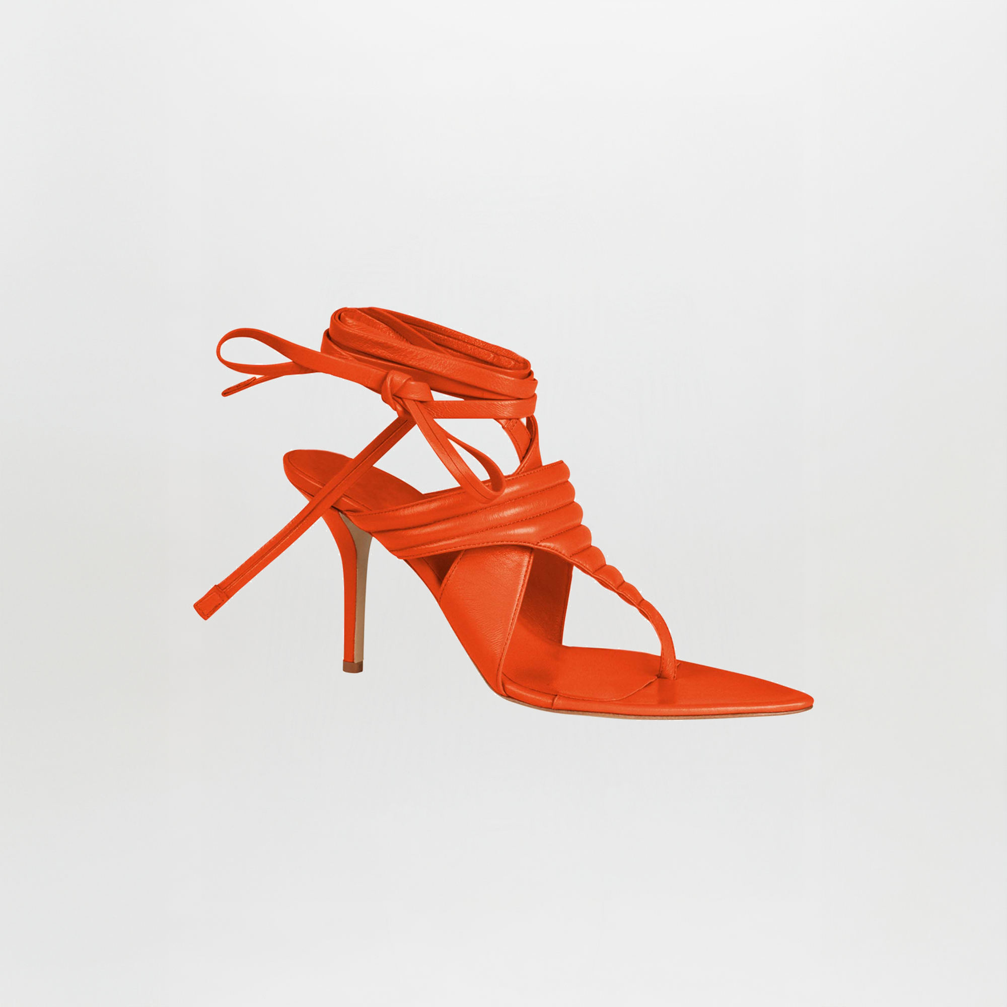 Dalila Heels Orange: Italian calf leather heels with a pointed toe, ankle straps, and a thin stiletto heel in bright orange, shown on a plain white background.
