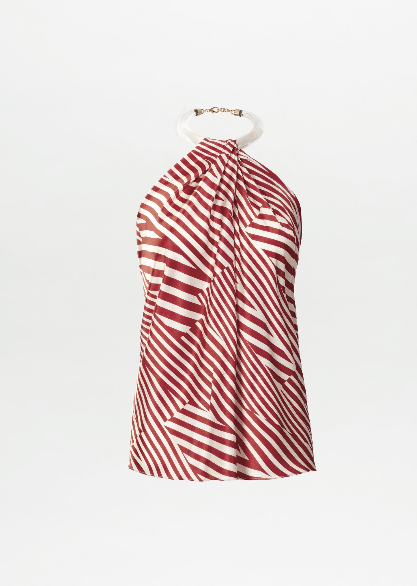 The Dianela Blouse is a sleeveless halter top made from fine Italian fabric, showcasing red and white diagonal stripes and a circular neck ring, set against a plain white background.