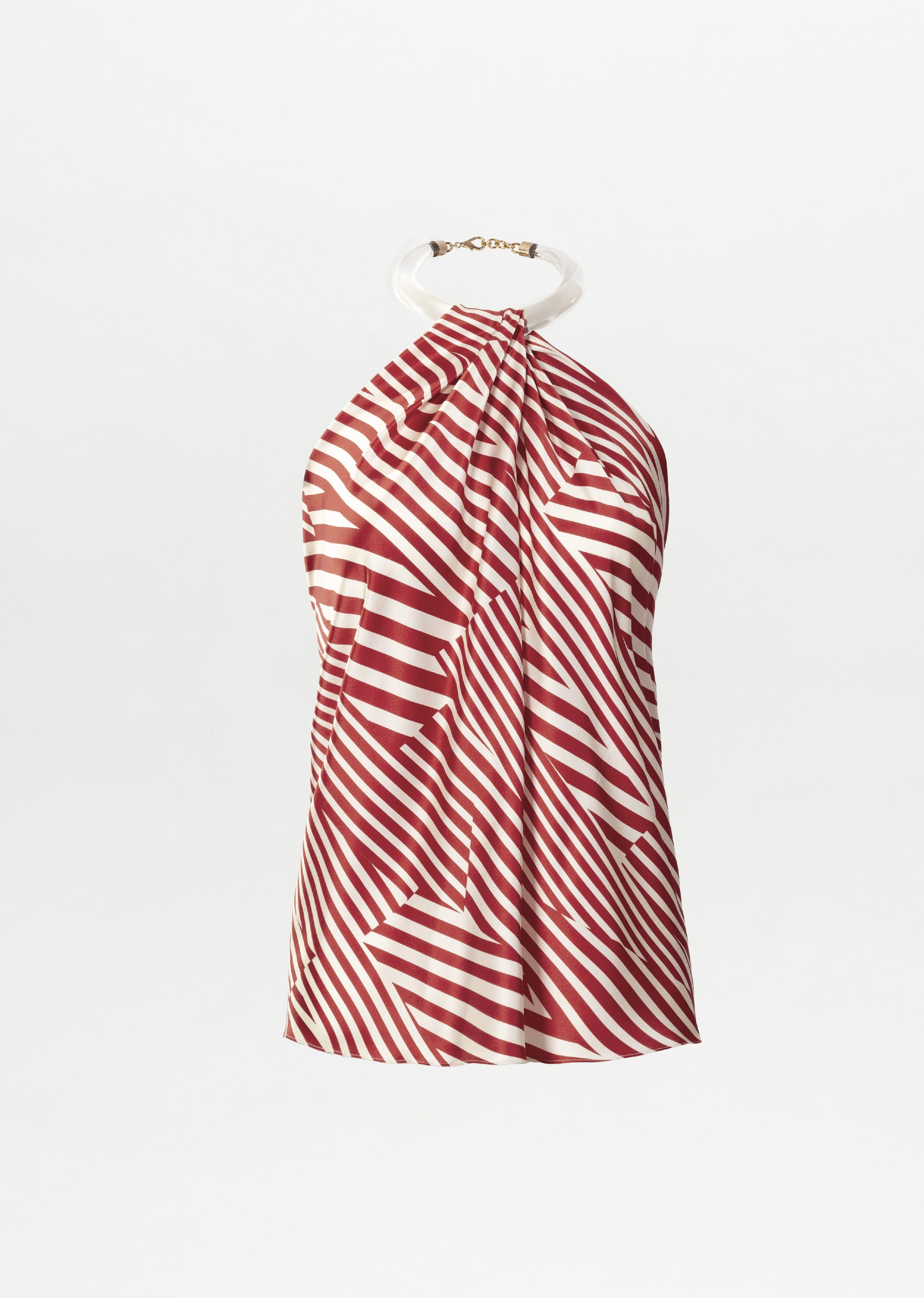 The Dianela Blouse is a sleeveless halter top made from fine Italian fabric, showcasing red and white diagonal stripes and a circular neck ring, set against a plain white background.