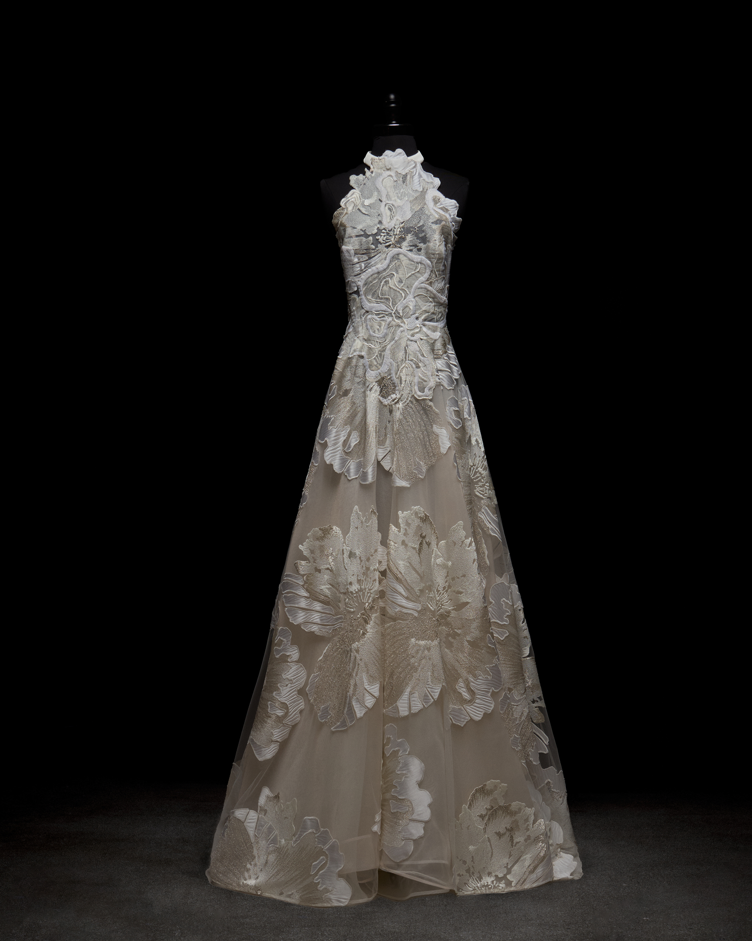 Elegant bridal lace dress on a black background