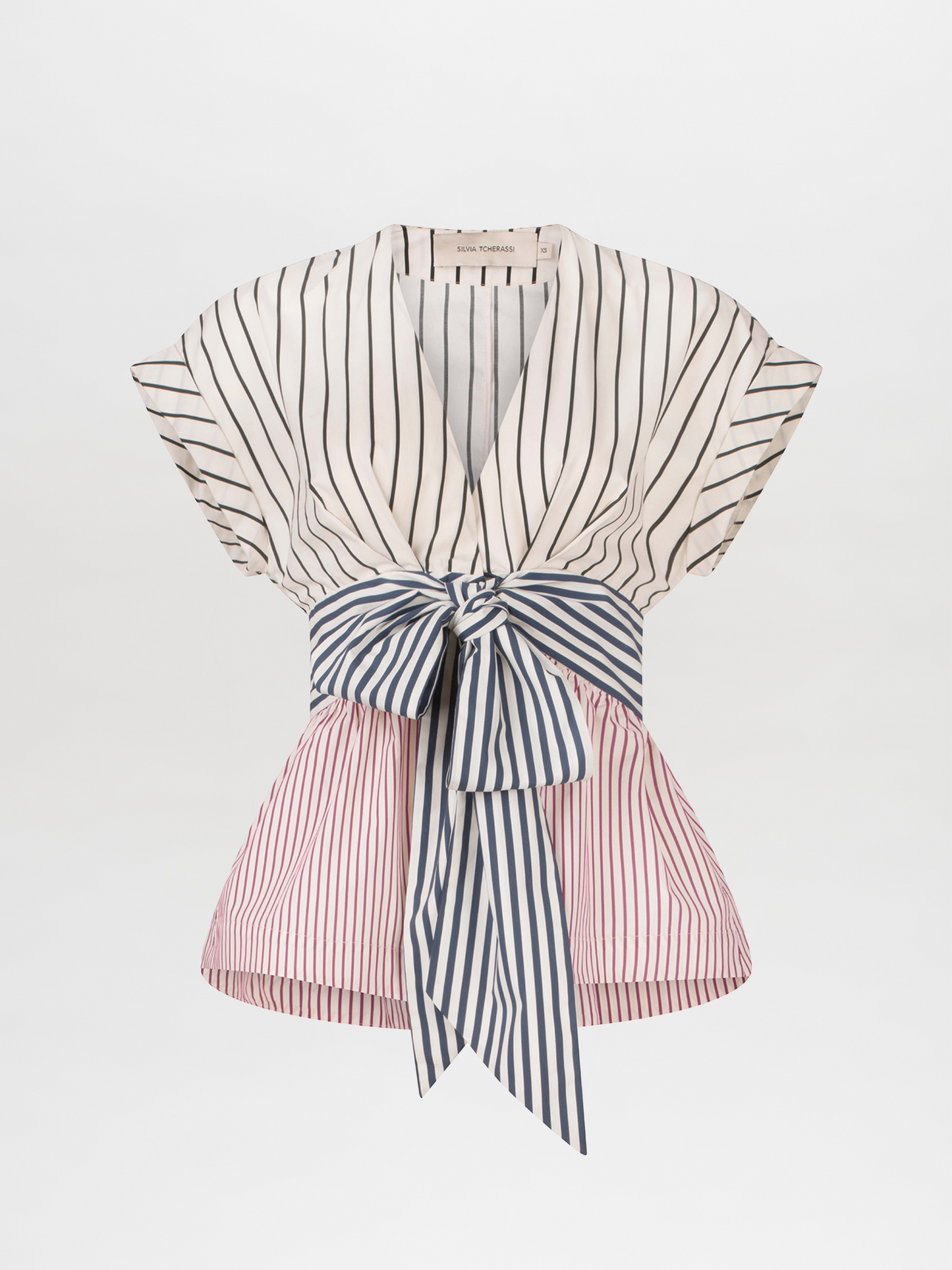 A white and blue striped Elia blouse with a bow, made of cotton fabric.