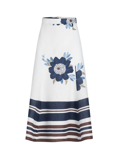 Erin Skirt Multi Navy Brown Floral featuring a white background with large blue floral designs and horizontal navy stripes near the hem, isolated on a white background.