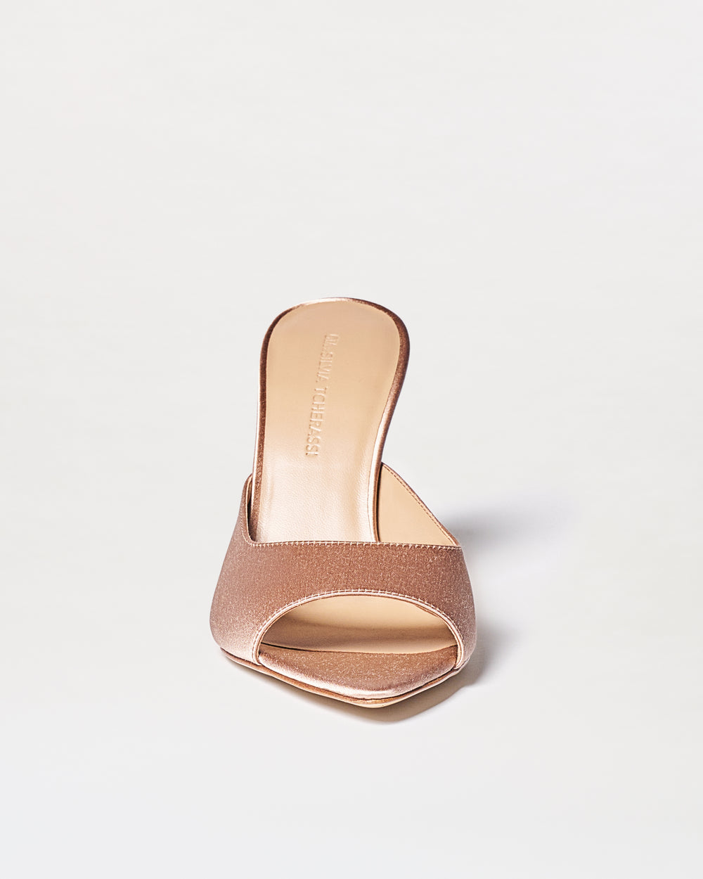 The Perni Heels, a single nude-colored, open-toe high-heeled mule with a textured finish, is centered on a plain white background and faces forward.