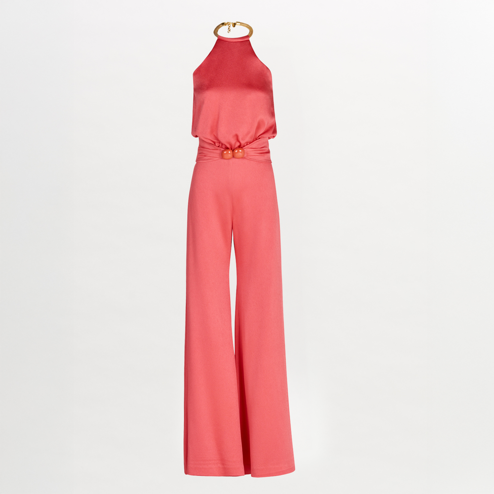 A Grosetto Jumpsuit Coral accessorized with a gold belt perfect for Resort 2024.
