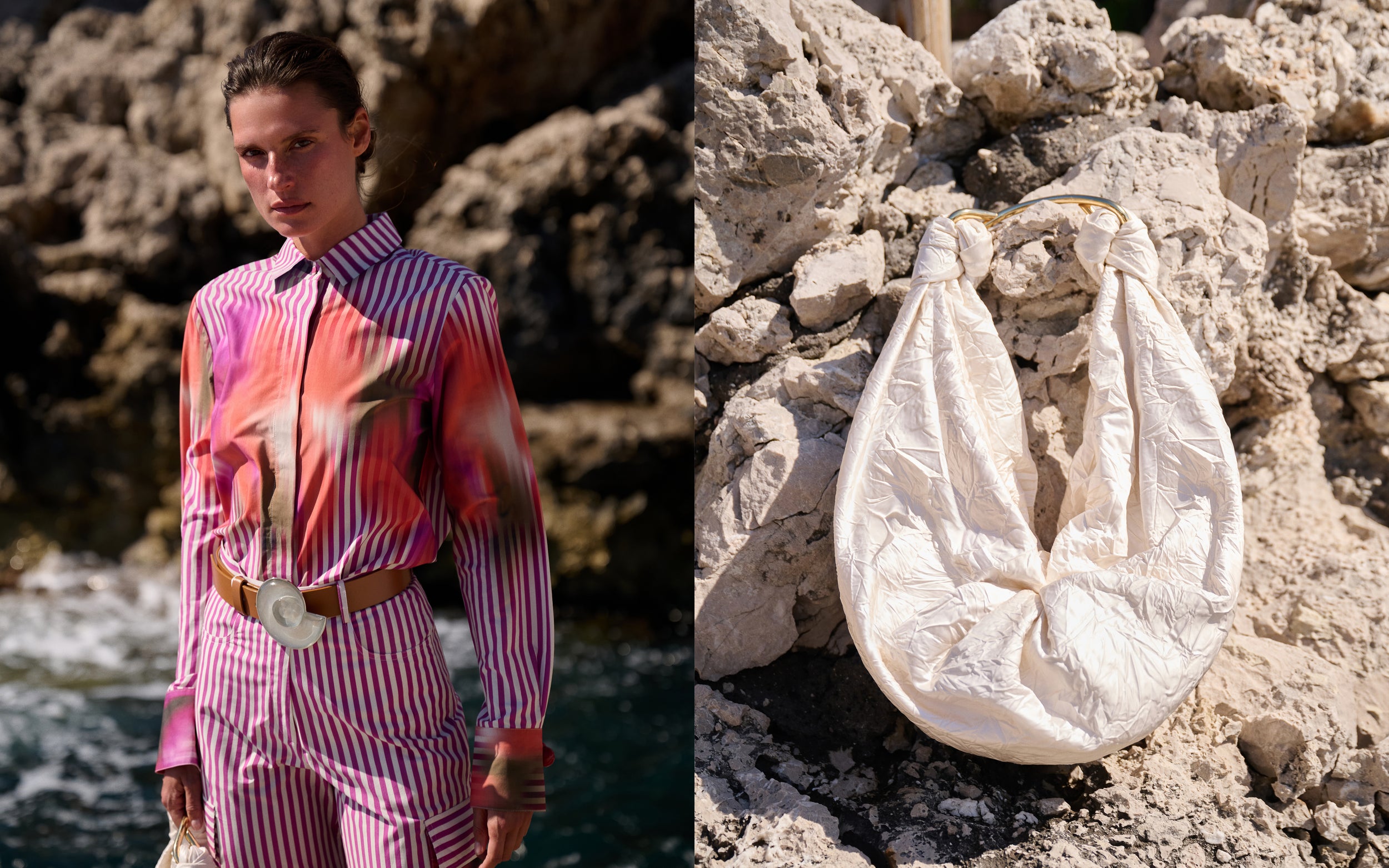 Person wearing a colorful outfit with a textured wall background, and a white bag on rocky ground.