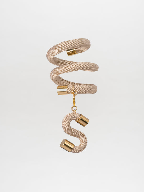 Gold-plated brass twisted rope bracelet with an elegant "S" charm, showcasing Tcherassi design finesse, known as the Nicky Bracelet Pearl.