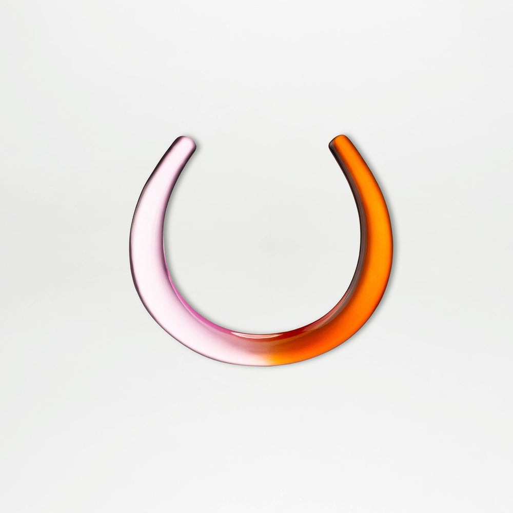 Colorful neckpiece on a light gray background