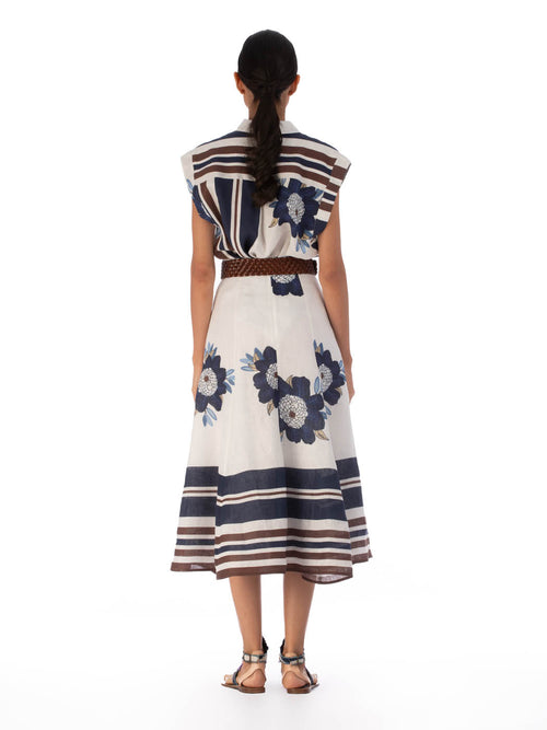 Erin Skirt Multi Navy Brown Floral featuring a white background with large blue floral designs and horizontal navy stripes near the hem, isolated on a white background.