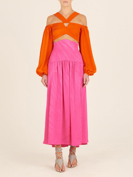 Bright pink sleeveless dress with a high neckline and a full-length, Callie Skirt Fuchsia, displayed on a white background.