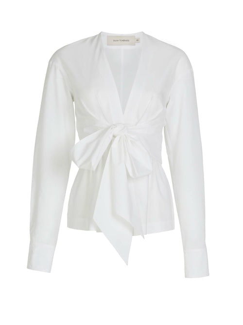 A Saanvi Blouse White with a v-shaped neckline and a bow at the neck.