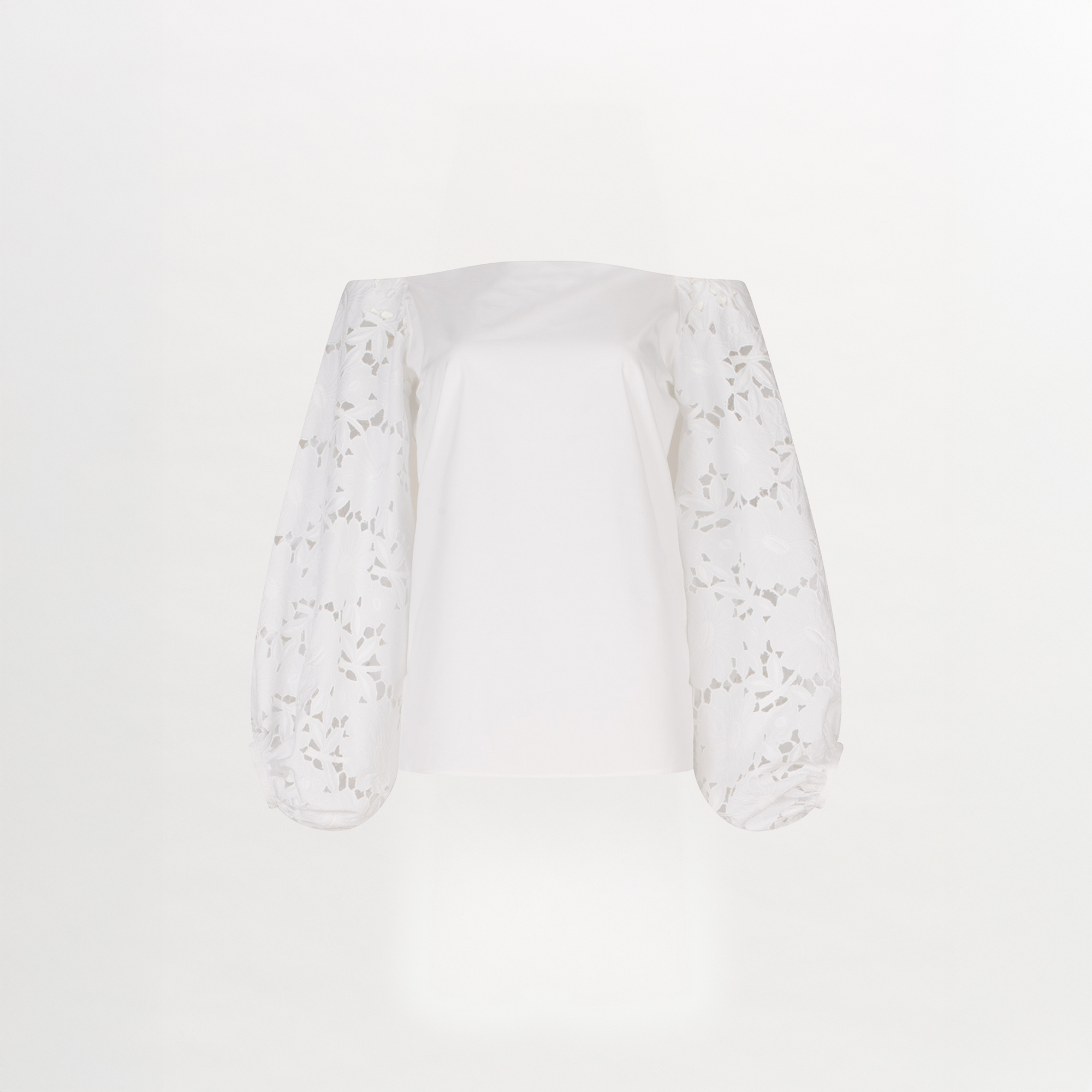 A white Stephanie Blouse White with lace bishop sleeves.