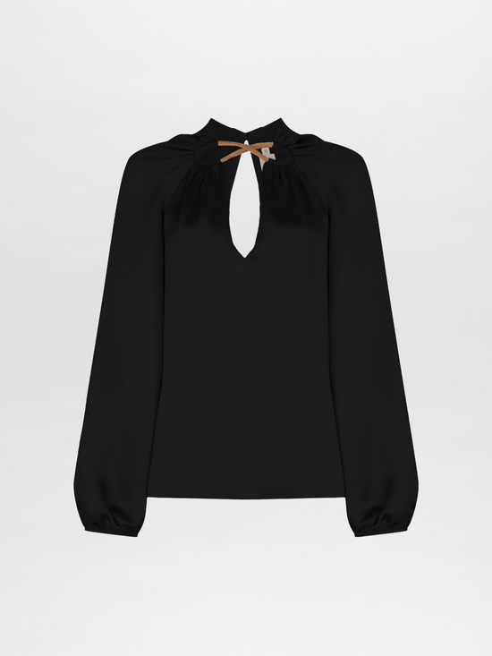 A Ximena Blouse in black silk, showcasing elegant metallic detailing, with a keyhole opening and gathered neckline, displayed on a plain white background.