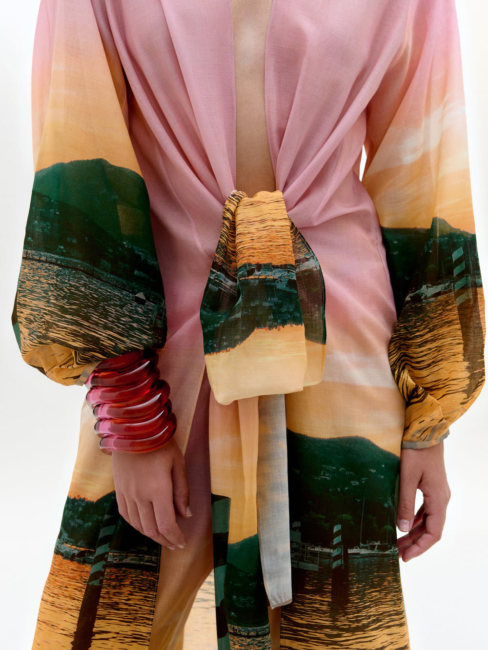 Colorful garment with abstract patterns on a plain background
