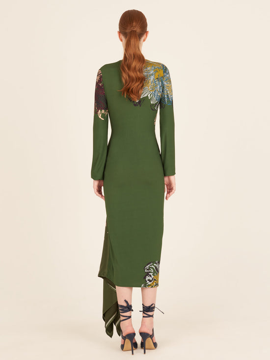 Ananya Dress Green Floral long-sleeve dress with an asymmetric hem, featuring a fabric flower embellishment on the side.