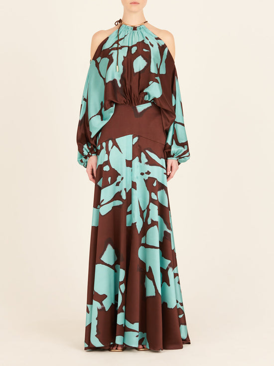 A unique print Bahar Dress Celeste Cacao in silk with a blue and brown floral design.