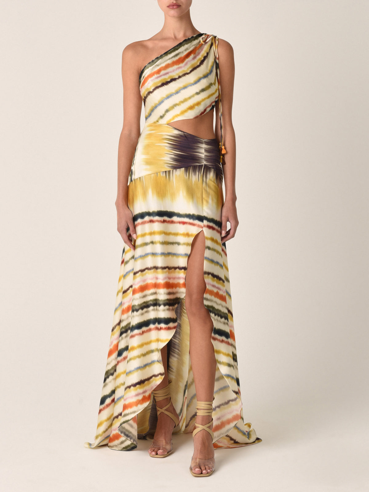 One-shoulder, asymmetric Whitney Dress Multi Hazy Stripe with a silk print and a cinched waist detail.