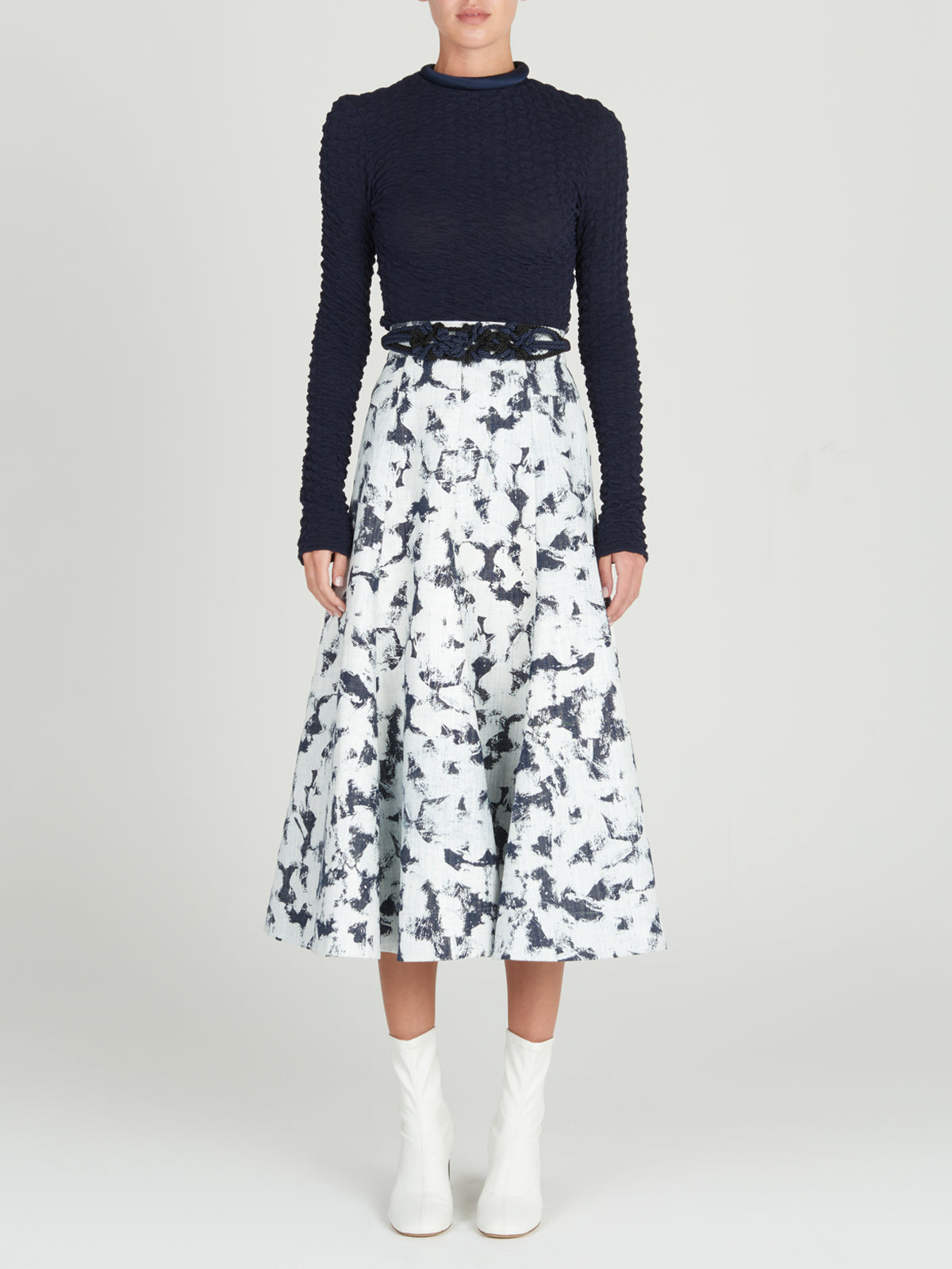 A women's long-sleeved Jari Top Navy, crafted from jacquard fabric, making it a versatile piece for Resort 2024.