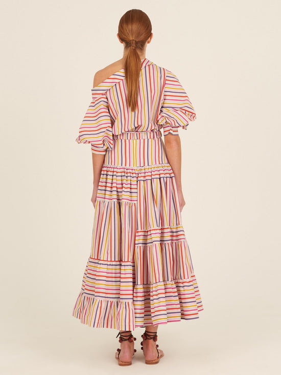 The Magnolia Skirt Golden Magenta Stripes by Silvia Tcherassi features colorful stripes and ruffles for a playful look.