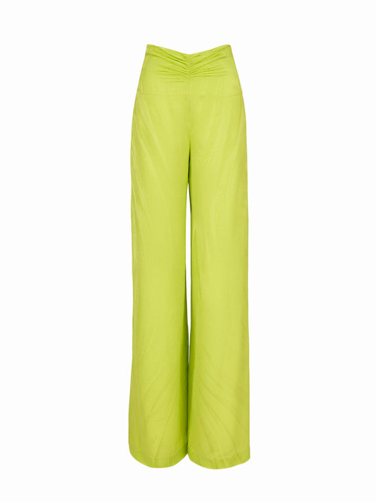 A woman's Casey Pant Verde Lime, wide-leg, flattering drape pants.